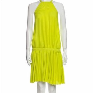 ALEXIS halter neck knee length dress.  Never been worn has the real real tag.